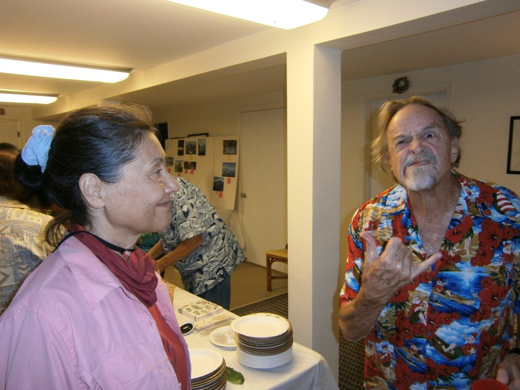 Gary making a funny face while Vic smiles at him