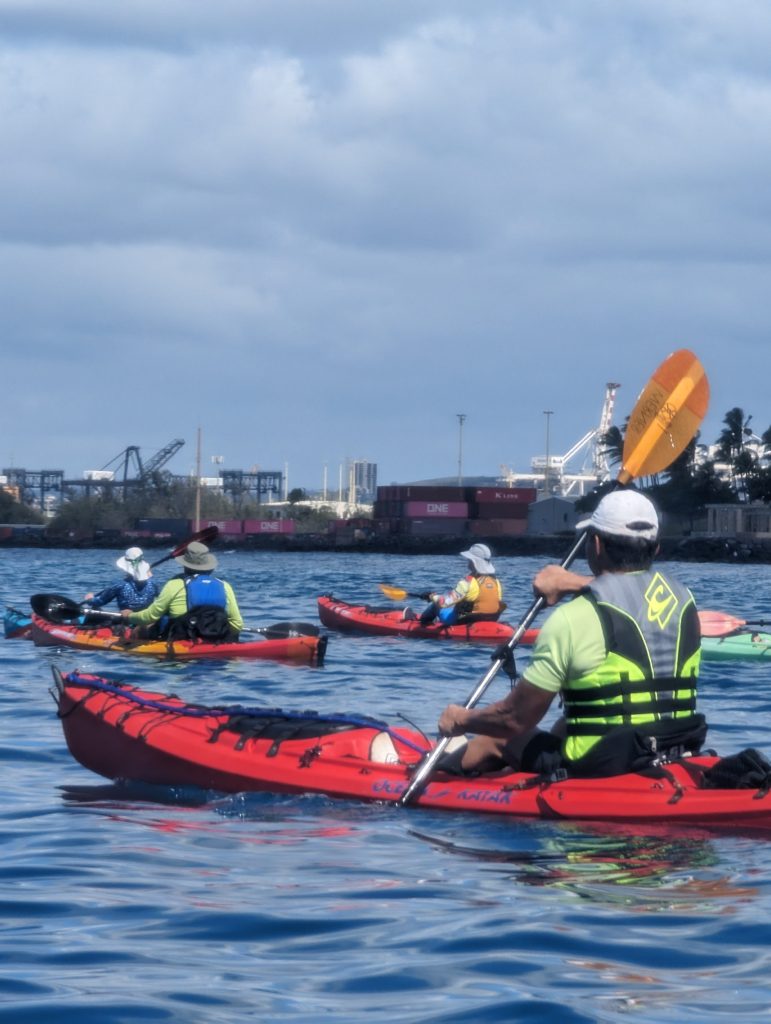 Kayakers approaching Honolulu Harbor
