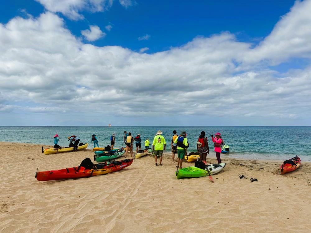 Kayaks at the water's edge at Makaha Beach