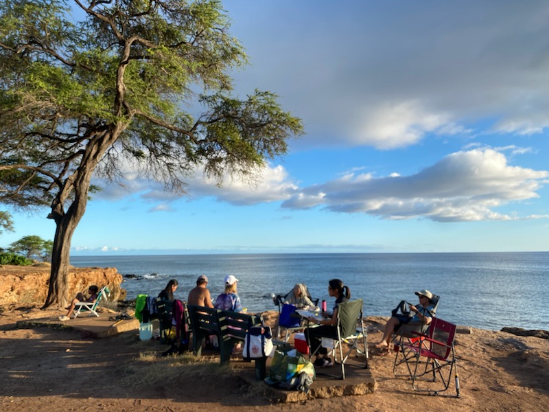 Club members enjoying a picnic dinner