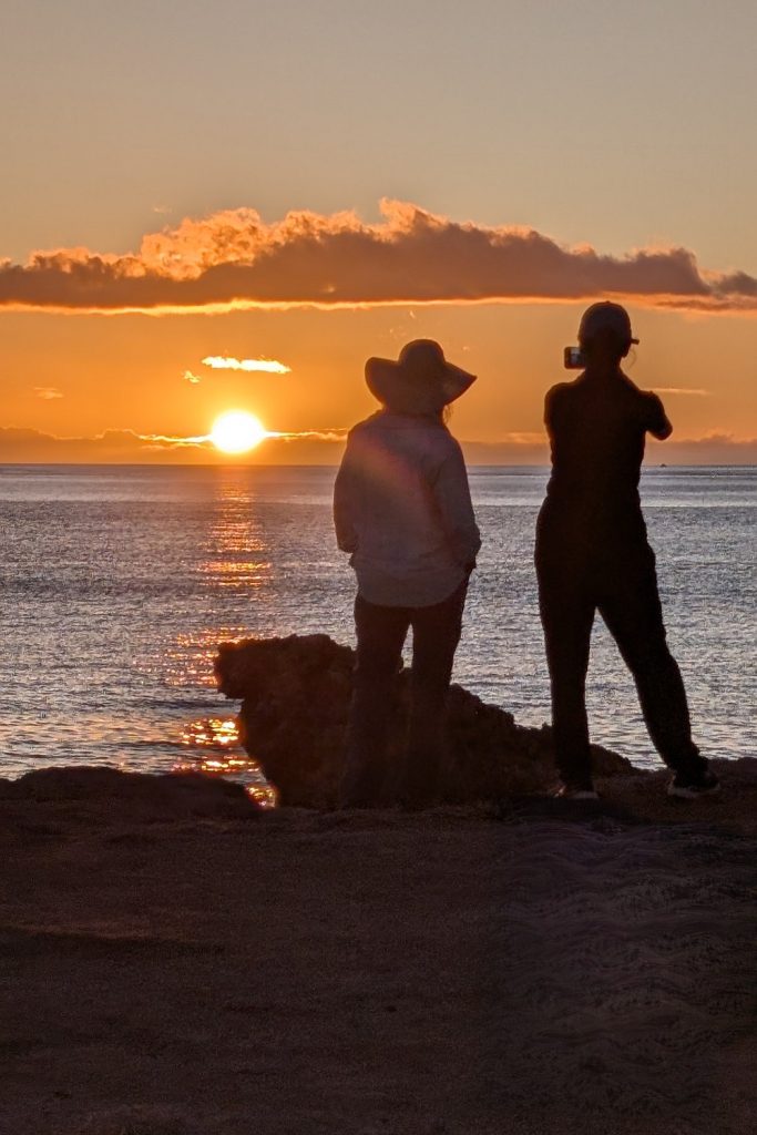 Beth and Won Yee watching sunset